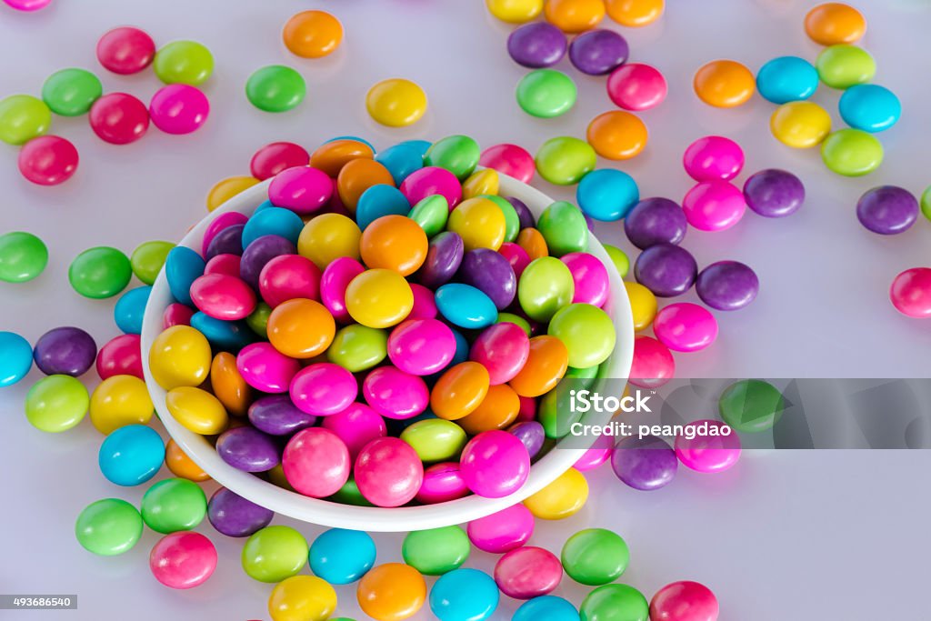 Top view Colorful chocolate candy in a ceramic bowl 2015 Stock Photo