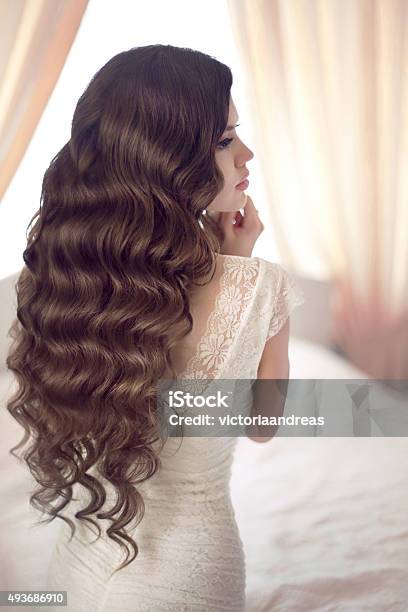 Beautiful Brunette Bride With Long Healthy Wavy Hair Styling Stock Photo - Download Image Now