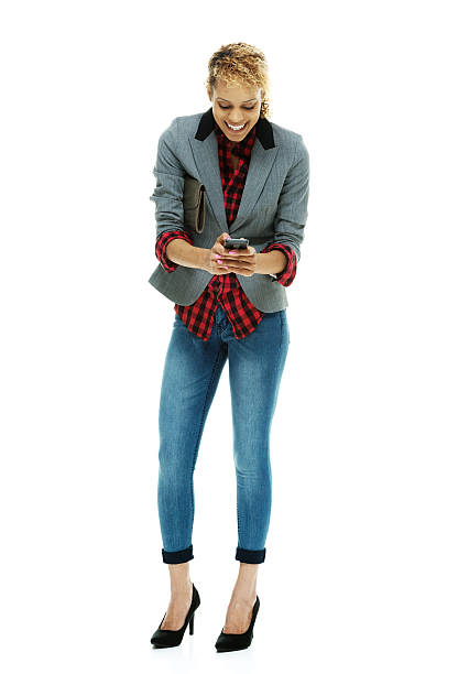 istock Cheerful casual woman using mobile 493687770