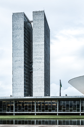 Brasilia, Brazil - March 21, 2015: The famous Brazilian National Congress in Brasilia, Brazil. The building was designed by Oscar Niemeyer in the modern Brazilian style.