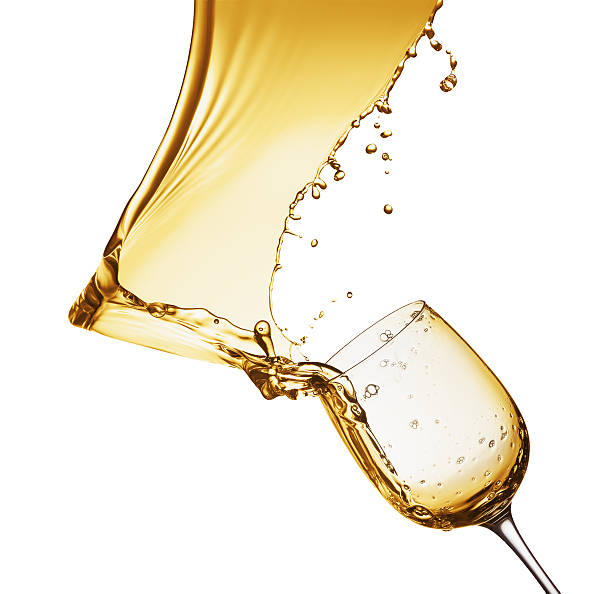 istock champagne splash from glass isolated on the white background 493690650