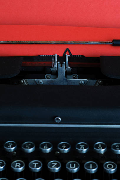 istock Vintage typewritter with red paper 493691170
