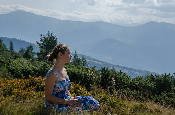 istock Young woman at the mountain 493693990