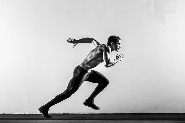 runner hispanique - sprint course sur piste photos et images de collection