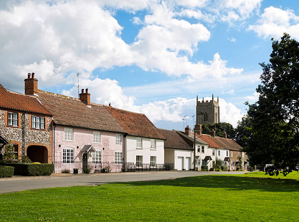 istock Cottages and village green, Great Massingham 493695422