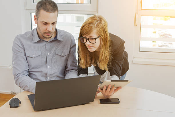 istock Young group of people discussing business plans 493695798