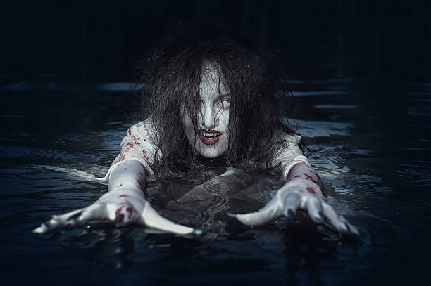 istock Beautiful witch woman standing in the river 493695806