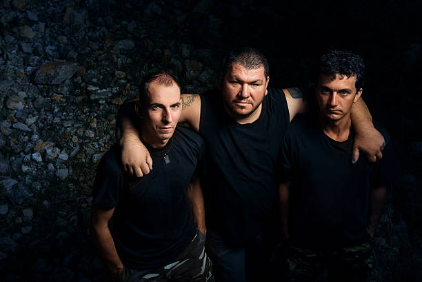 istock portrait of rock band members 493696226