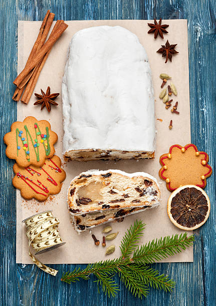 istock Christmas Stollen, spices and cookies. vertical 493696406