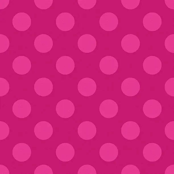 Photo of Seamless pink textured paper with polka dots