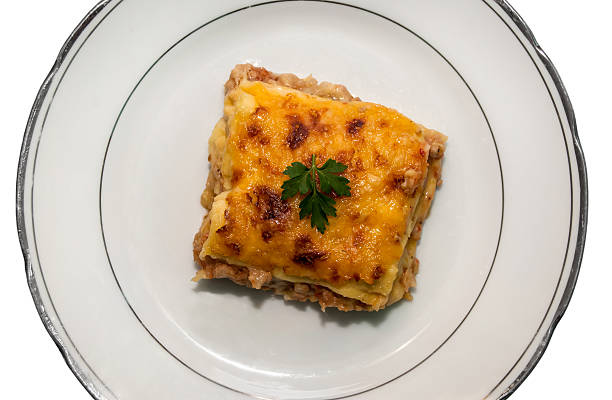 istock Portion of lasagna with meat isolated on plate 493700066