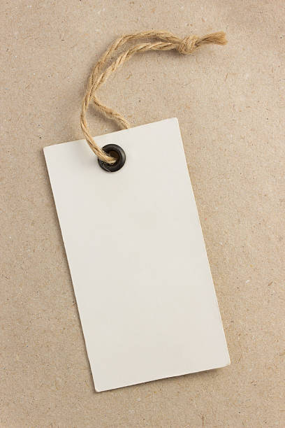 istock price tag label at paper texture 493708585