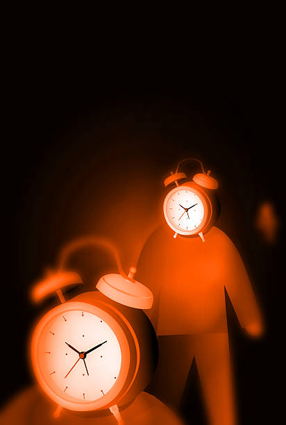 istock Alarm Clock with People 493708797