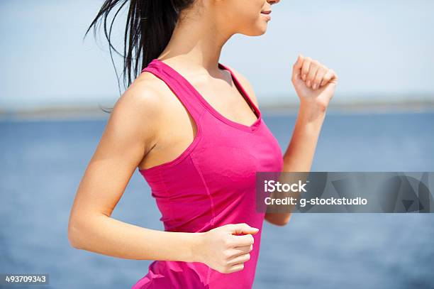 Enjoying Her Daily Jog Stock Photo - Download Image Now - Active Lifestyle, Activity, Adult