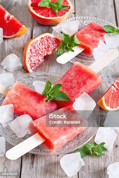 Red Grapefruit Popsicles Stock Photo - Download Image Now - Flavored Ice, Grapefruit, Cream - Dairy Product