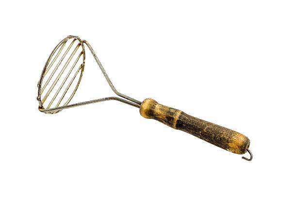 Antique Potato Masher stock photo