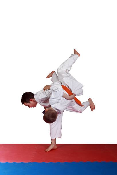 istock Training a throw judo athletes in  white kimono 493711255
