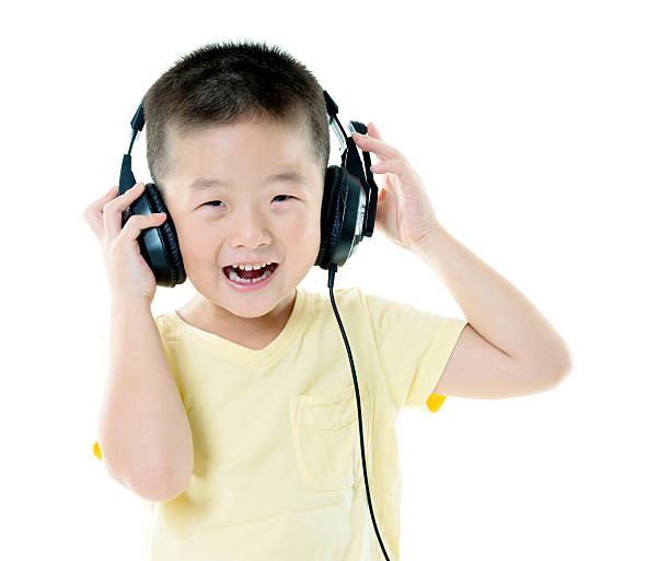 istock Little boy wearing headphones 493711270