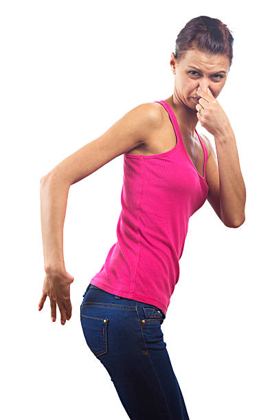 Unpleasant odors http://i1364.photobucket.com/albums/r725/hofi99/UJBANNER2/andrea_banner_zps2cf1a621.jpg holding nose stock pictures, royalty-free photos & images