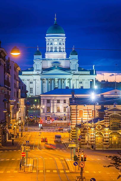 Roof Corner of Helsinki Cathedral with one statue and golden cross