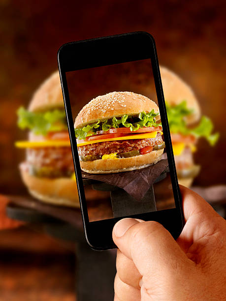 istock Mobile Photography of a CheeseBurger 493716172