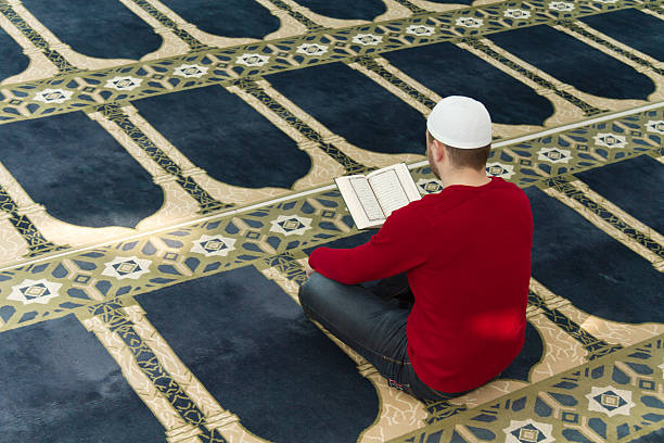 istock Muslim Man Is Praying In The Mosque 493717820