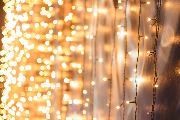 istock Christmas garland, gold bokeh 493724352