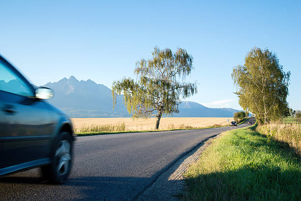 istock car moving to High Tatra mountains 493725810