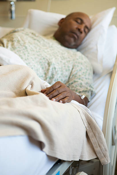 istock Man in hospital bed 493738352