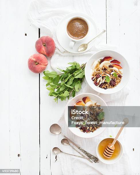 Healthy Breakfast Bowl Of Oat Granola With Yogurt Fresh Fruit Stock Photo - Download Image Now