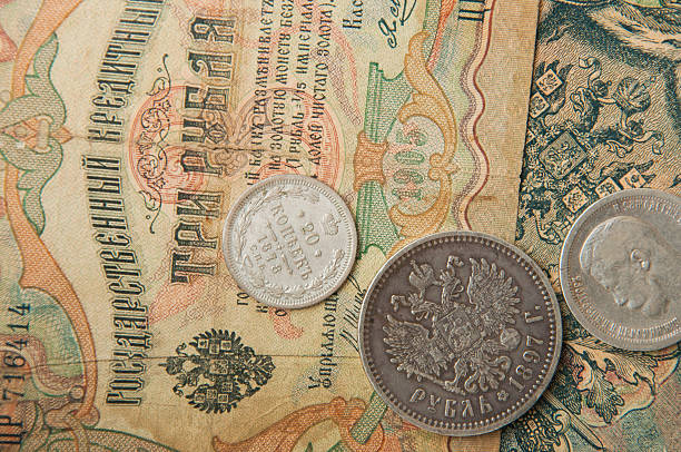 istock ancient Russian, silver coins , old banknotes wallpapers with old money 493743066