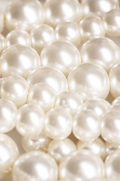 istock Pile of pearl on the white background 493744754