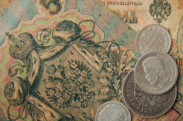 istock ancient Russian, silver coins , old banknotes wallpapers with old money 493745098