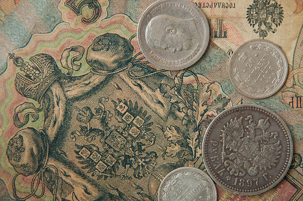 istock ancient Russian, silver coins ,old banknotes  wallpapers with old money 493745342