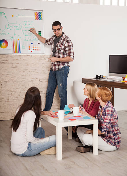 istock Young team trying to get good ideas 493745562