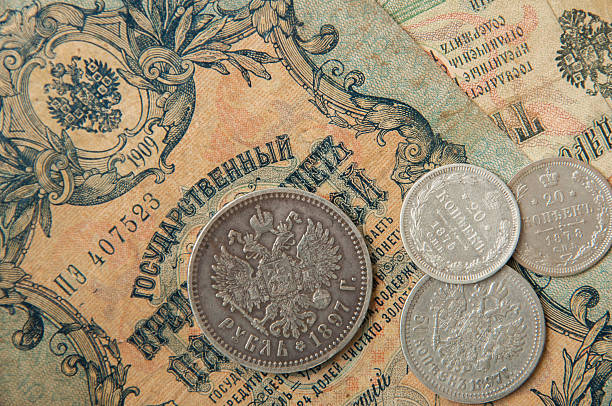 istock ancient Russian, silver coins , old banknotes  wallpapers with old money 493746042