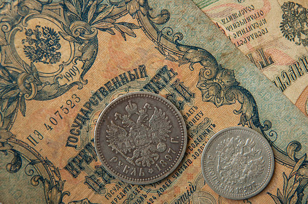 istock The ancient Russian, silver coins , old banknotes  wallpapers with old money 493746132