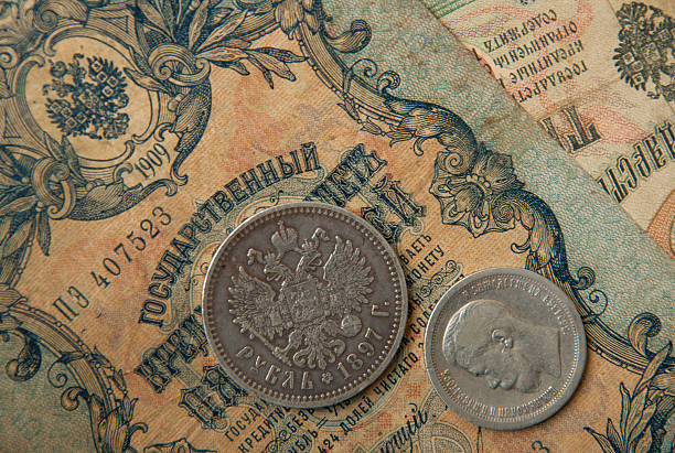 istock The ancient Russian, silver coins , old banknotes  wallpapers with old money 493746266