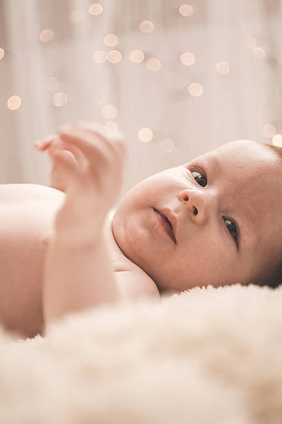 istock Beautiful infant raising hand 493748874