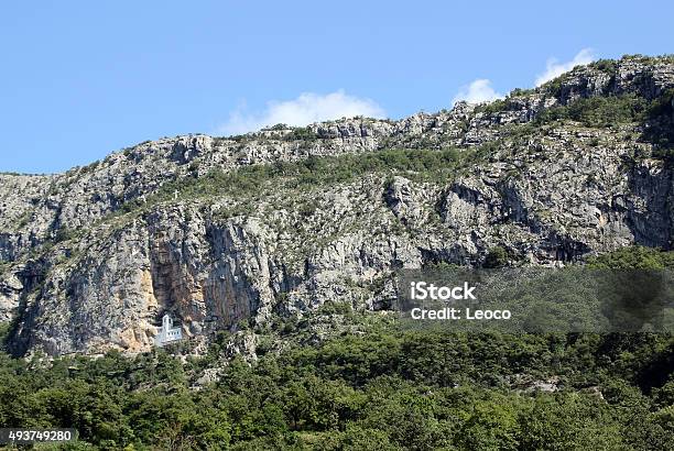 Monastery In The Rock Stock Photo - Download Image Now - 2015, Above, Arch - Architectural Feature