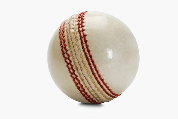 nahaufnahme eines cricket ball - kricketball stock-fotos und bilder