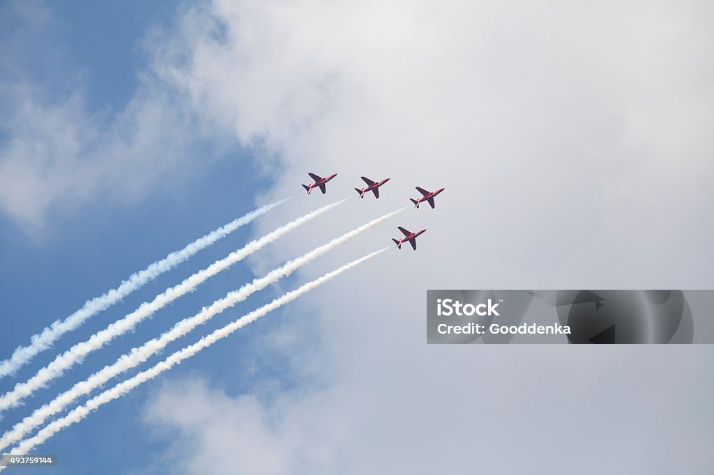 Military air show Planes on an air show against cloudy sky Airshow Stock Photo