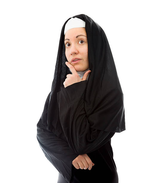 istock Young nun thinking with her hand on chin 493762459