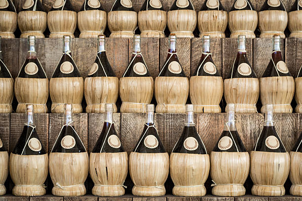 Italian fiascos as a background Italian fiascos as a background chianti region stock pictures, royalty-free photos & images