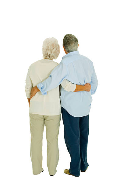istock happy elderly couple embraced from behind 493763860