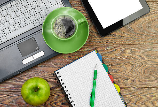 istock green apple on worplace 493765299