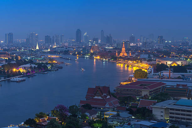 istock Bangkok cityscape river side at twilight can see wat arun 493768039