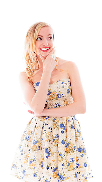 istock Young woman smiling with her hand on chin 493768257