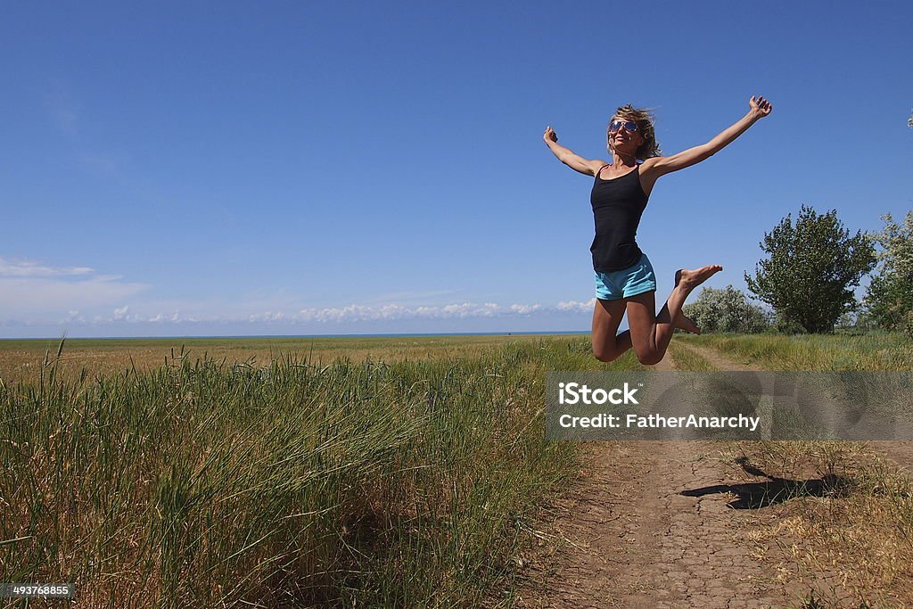 Jumping girl Adult Stock Photo