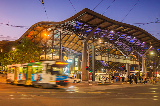 Melbourne, Australia - October 23, 2015: A tram goes past Southern Cross Station, a major interchange in the Melbourne public transport network. 